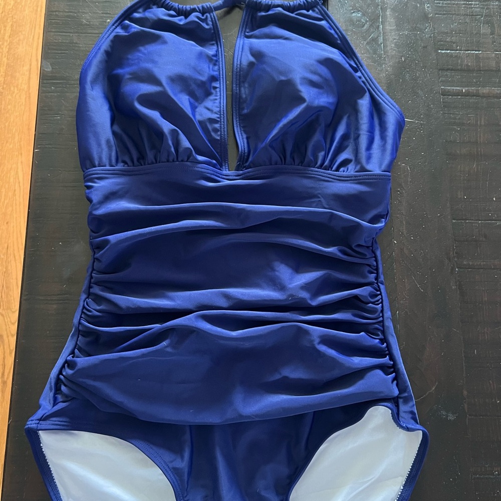 Be2prity low cut padded blue whole bathing suit in a size Small new with tags